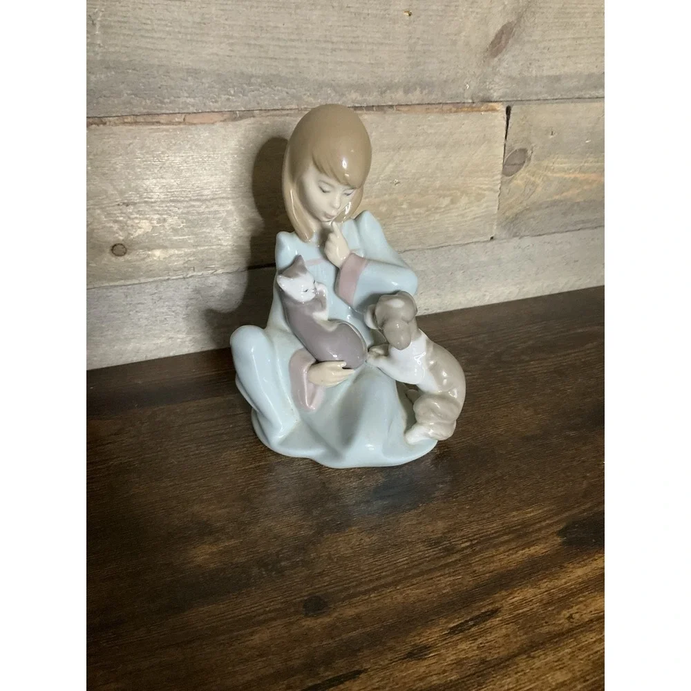 Cat Nap by Lladro, 1990 Girl with napping cat and puppy, #5640, Glazed, Spain
